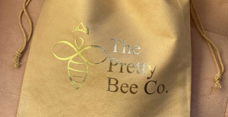 Close up of Pretty bee Co. dust bag