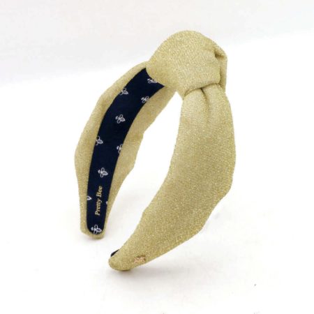 Knotted headband in gold lurex