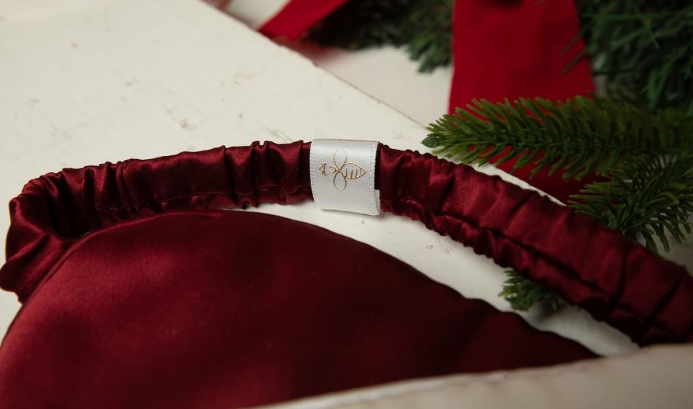 Close up of merlot silk eye mask